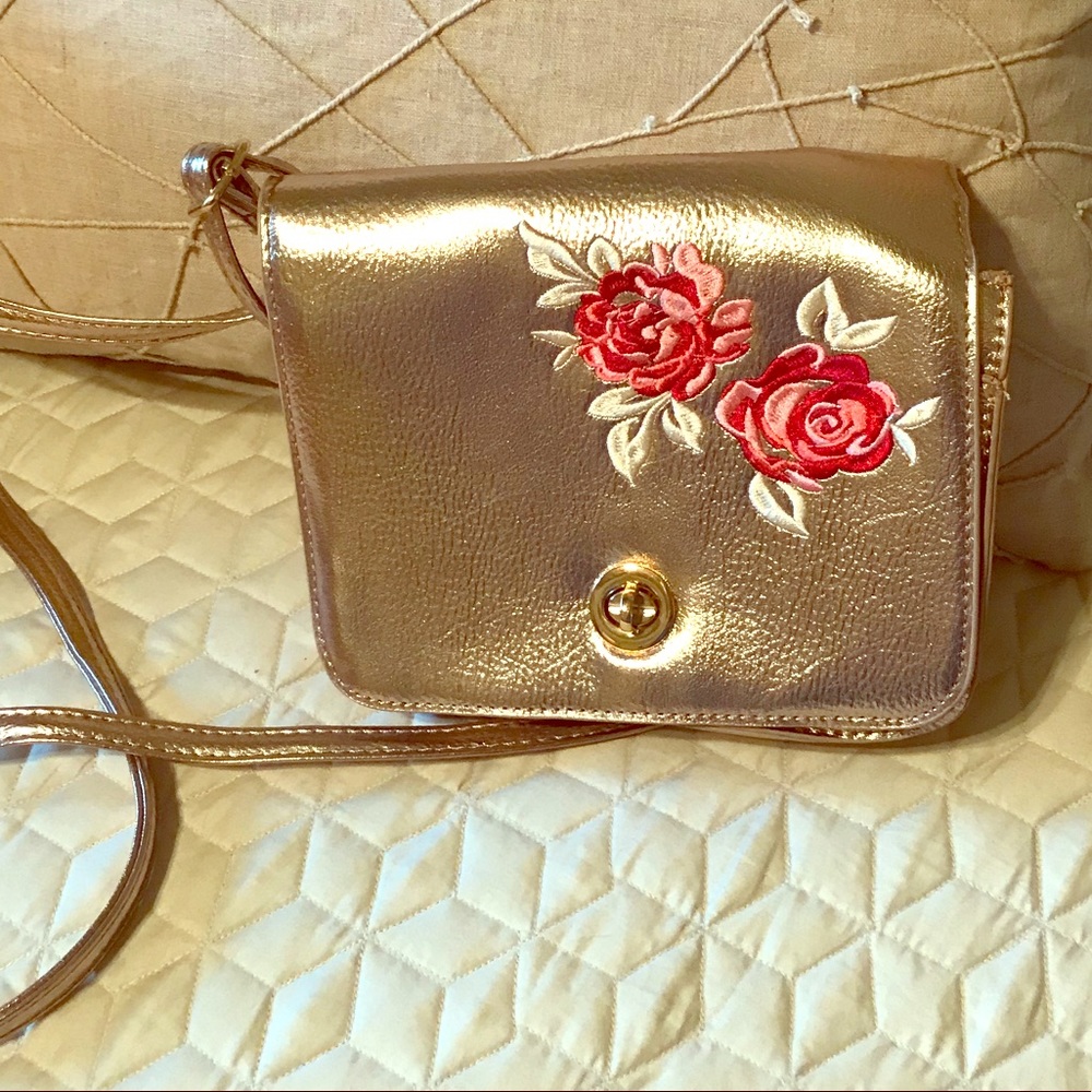 Gold cross body purse with roses